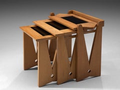 Guillerme and Chambron Set of Three Nesting Tables with Ceramic Tops