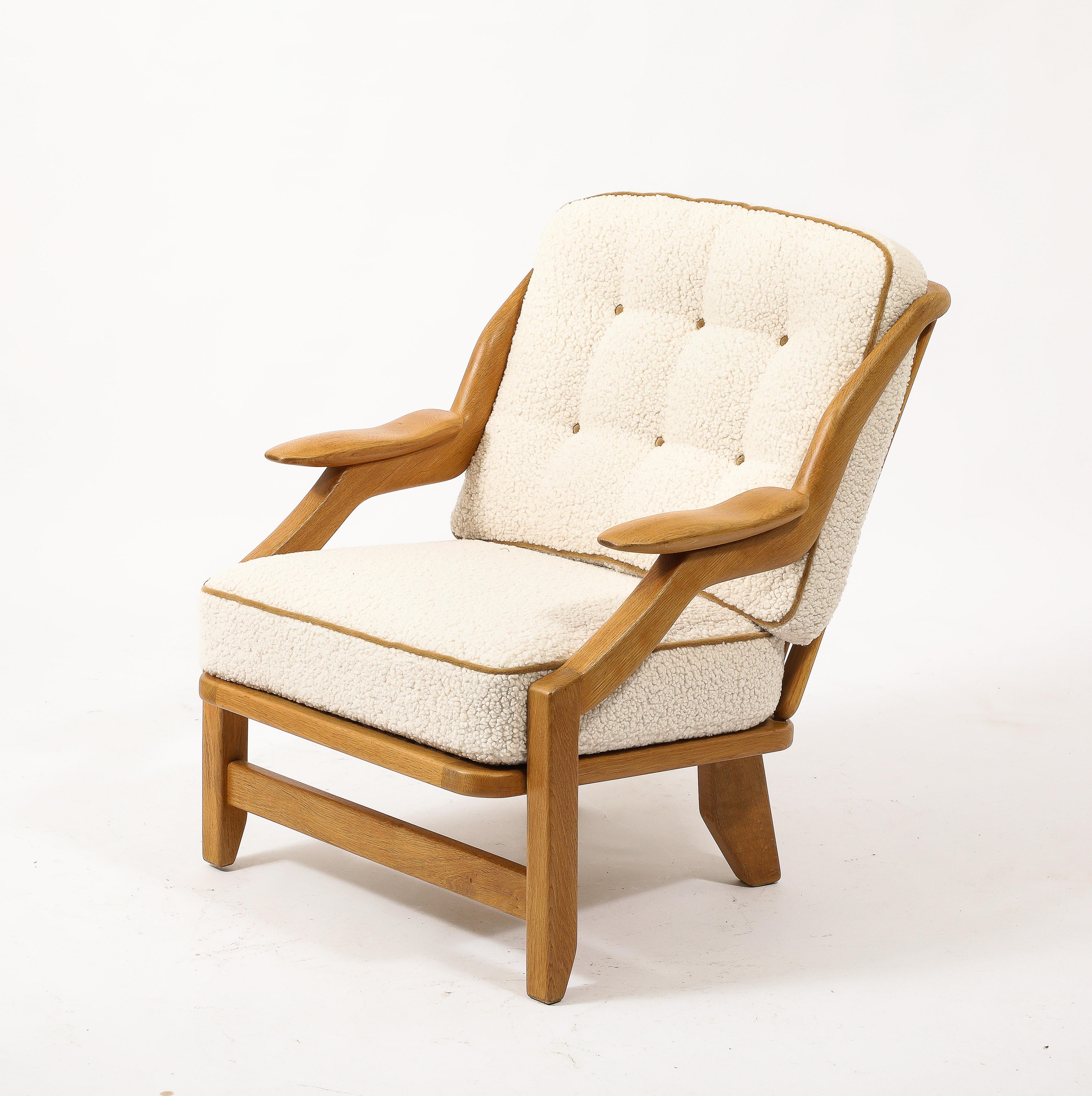 Pair of oak armchairs by G&C, refinished and reupholstered with latex cushions. Very comfortable.