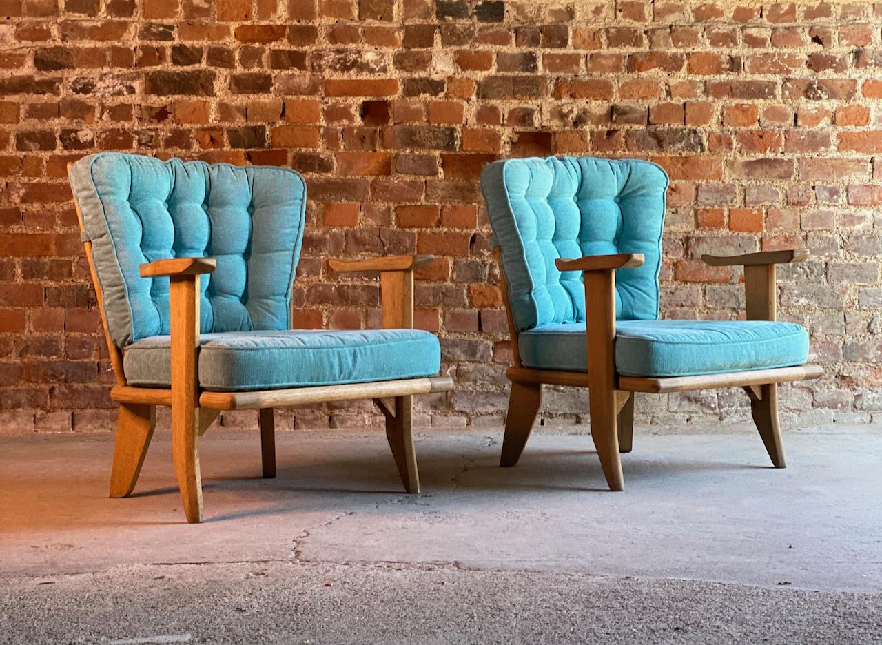 Guillerme & Chambron armchairs lounge chairs, France, circa 1950s

Striking pair of midcentury French design Robert Guillerme & Jacques Chambron, Votre Maison light Oak easy lounge chairs France Circa 1950s, upholstered in a beautiful sky blue