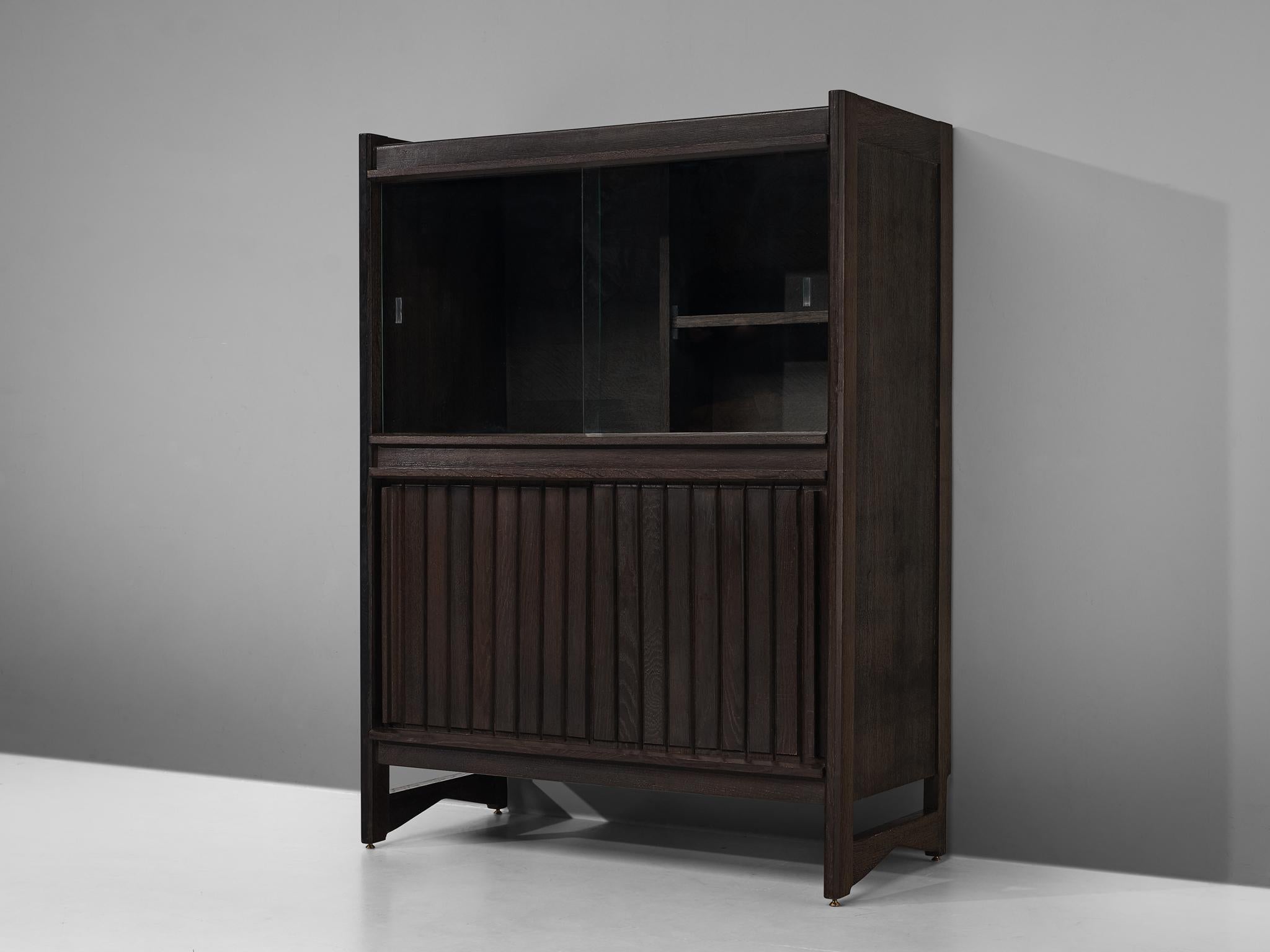 Guillerme & Chambron for Votre Maison, cupboard, stained oak, France, 1960s

This sculptural cabinet is made by the designer duo Guillerme & Chambron. The piece is executed in solid, stained oak and features sculptural lines and edges. The piece