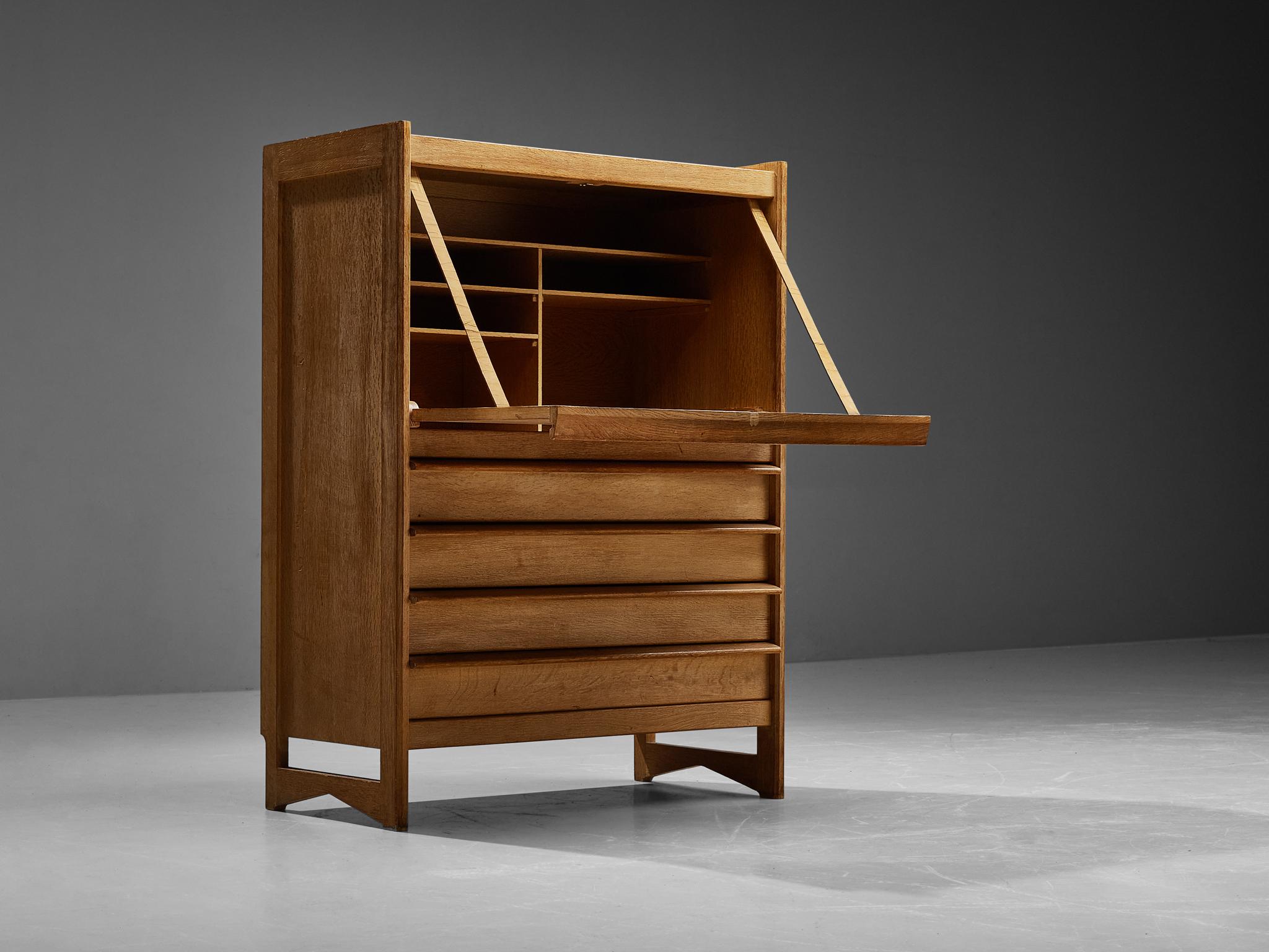 Guillerme & Chambron for Votre Maison, cabinet, oak, France, 1960s

This sculptural cabinet is made by the designer duo Guillerme & Chambron. The piece is executed in solid, oak and features sculptural lines and edges. The piece holds different