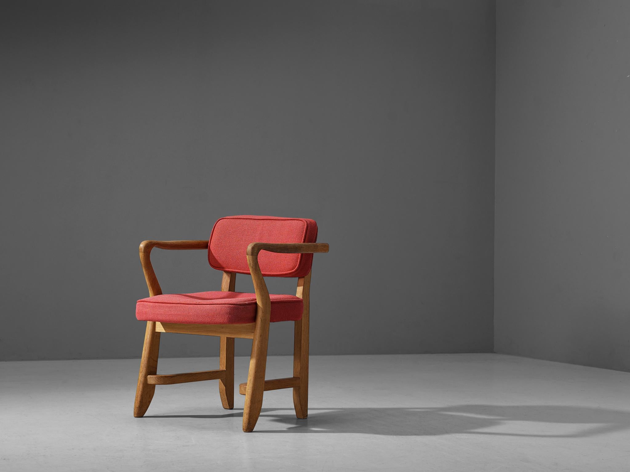 Guillerme & Chambron, 'Denis' armchairs, coral red fabric, oak, France, 1960s

This sculptural easy chair is designed by Guillerme & Chambron. The duo is known for their high quality solid oak furniture. The sculptural armchair has an interesting
