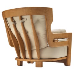 Sillón "Denis" Guillerme & Chambron de roble macizo y cuero