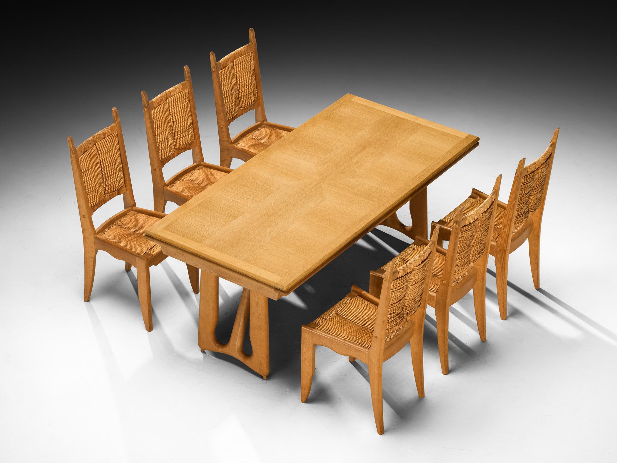 Guillerme et Chambron for Votre Maison, dining table, model 'L'Italienne', solid oak, France, 1960s

This L'Italienne dining room table is designed by the acclaimed French designer duo Jacques Chambron and Robert Guillerme. The legs of this table