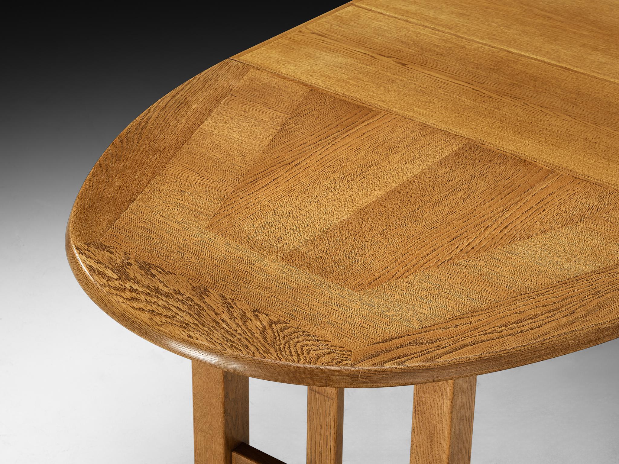 Mid-Century Modern Guillerme & Chambron Extendable Round Dining Table in Oak For Sale