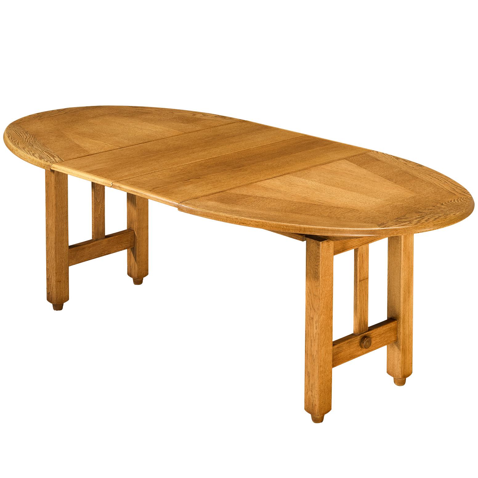 Guillerme & Chambron Extendable Round Dining Table in Oak For Sale