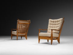 Guillerme & Chambron for Votre Maison Pair of 'Edouard' Lounge Chairs in Oak