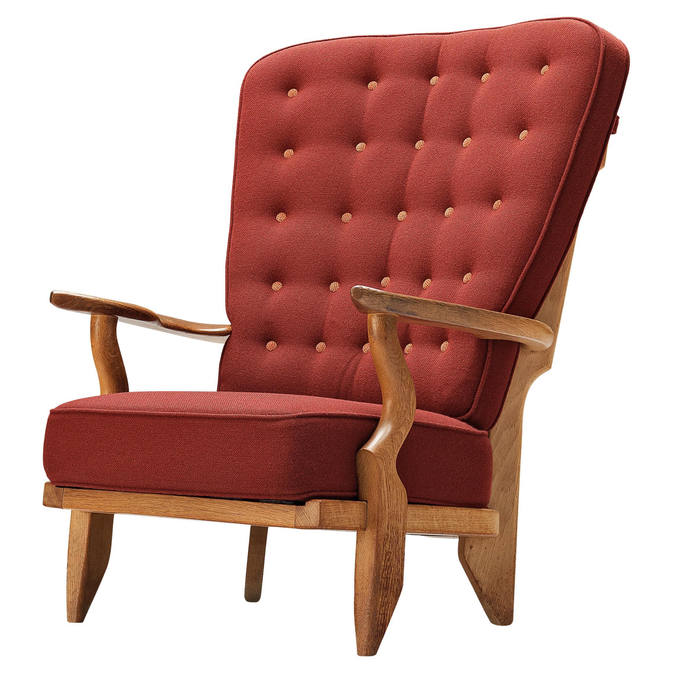 Chaise longue « Grand Repos » de Guillerme & Chambron en tissu rouge et chêne 