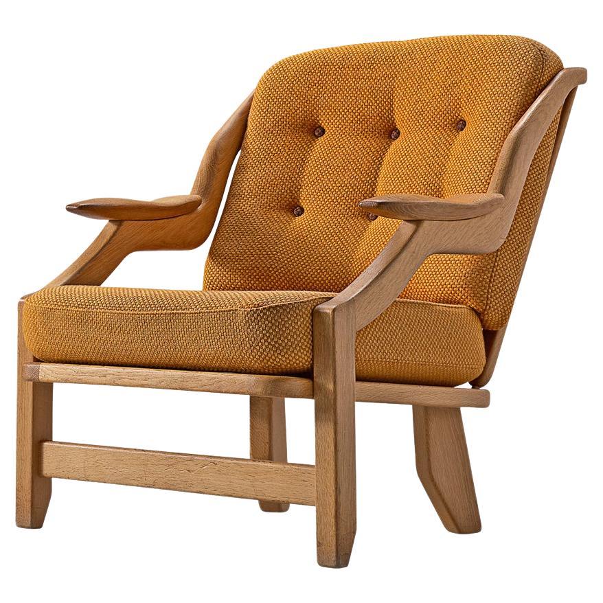 Guillerme & Chambron 'Gregoire' Lounge Chair in Oak  For Sale