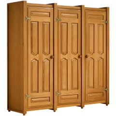 Guillerme & Chambron Armoire haute ou armoire en chêne et laiton