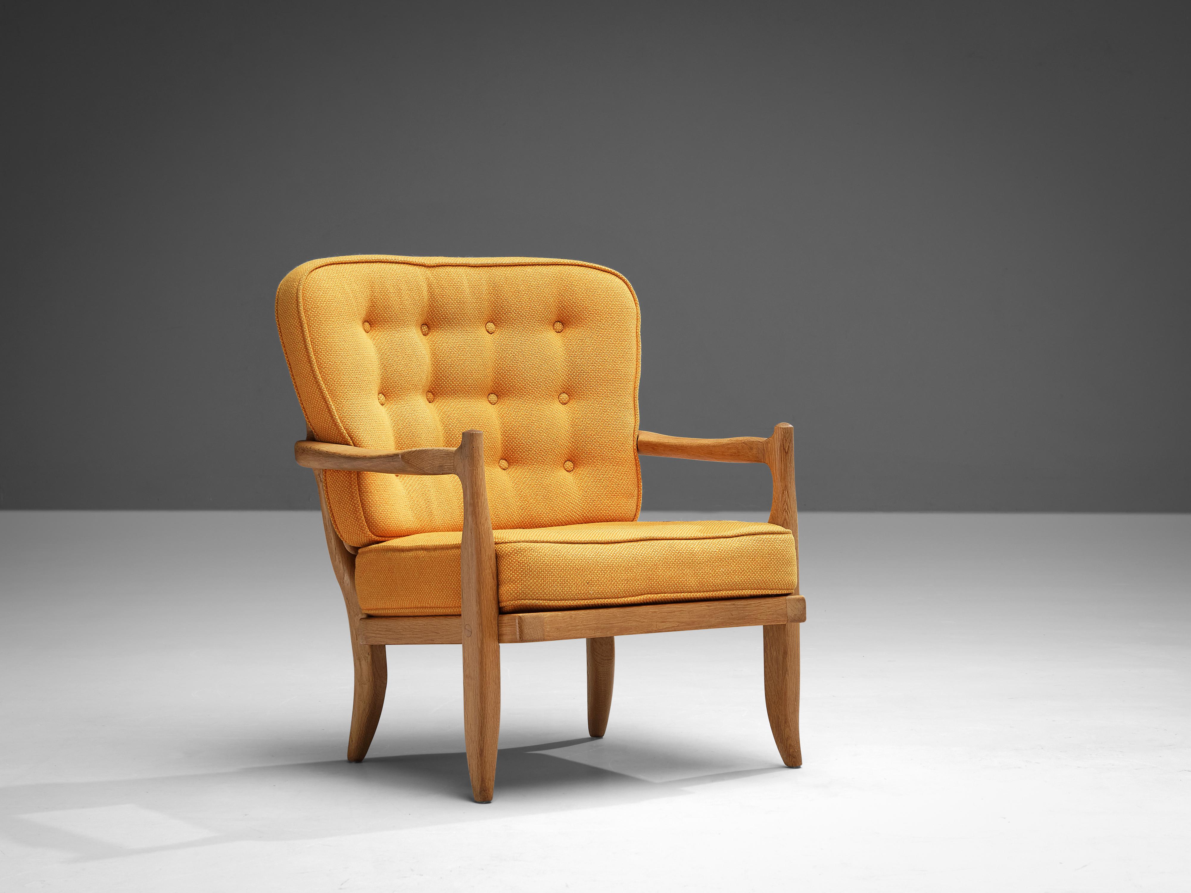 Guillerme & Chambron, armchair model ‘Jose’, oak, fabric, France, 1950s

Characteristic lounge chair by French designer duo Guillerme & Chambron. While the front convinces with its clear appearance, the backrest is surprisingly ornamental with