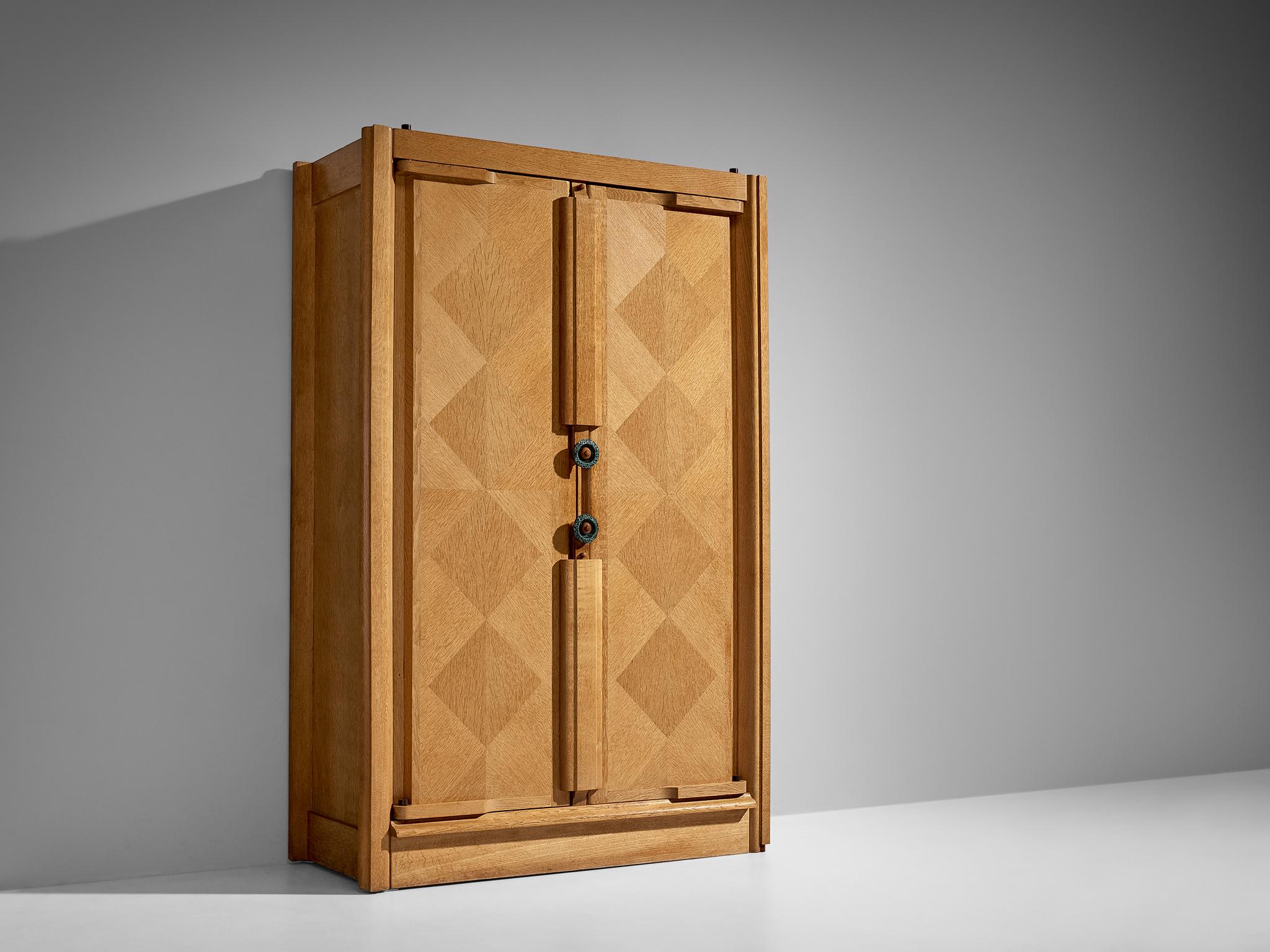 Guillerme et Chambron for Votre Maison, cabinet, oak, France, 1960s

This cabinet or case piece is designed by Guillerme and Chambron and features a front with beautiful geometric oak inlays, which is characteristic for the French designer duo. The