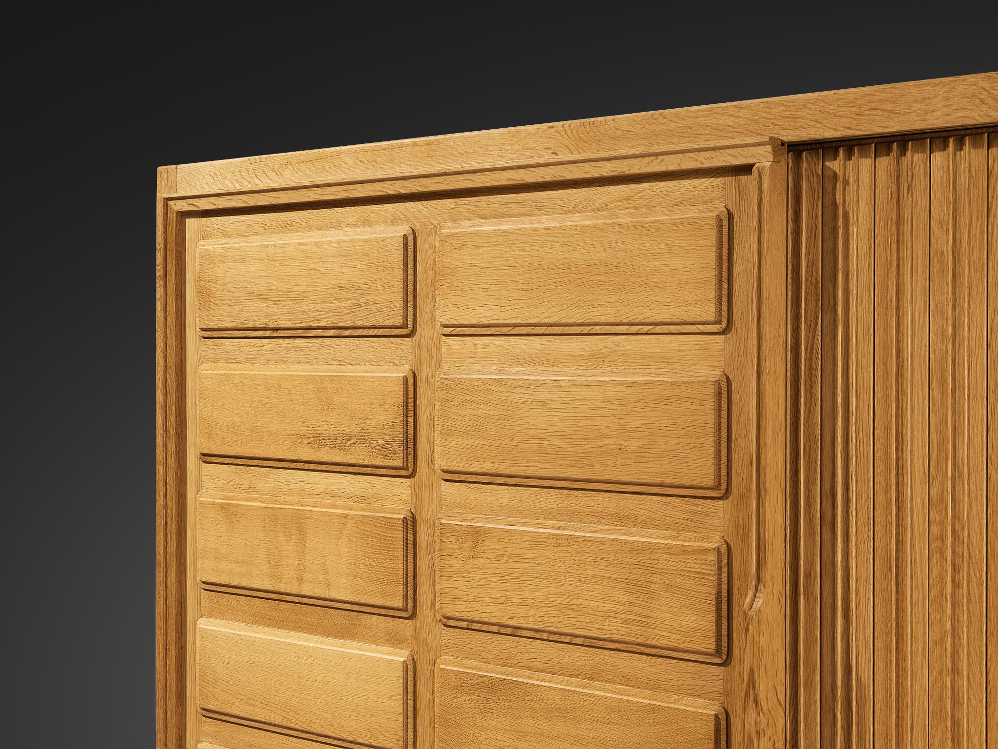 Mid-20th Century Guillerme & Chambron Large Highboard or Wardrobe in Oak with Carved Doors For Sale