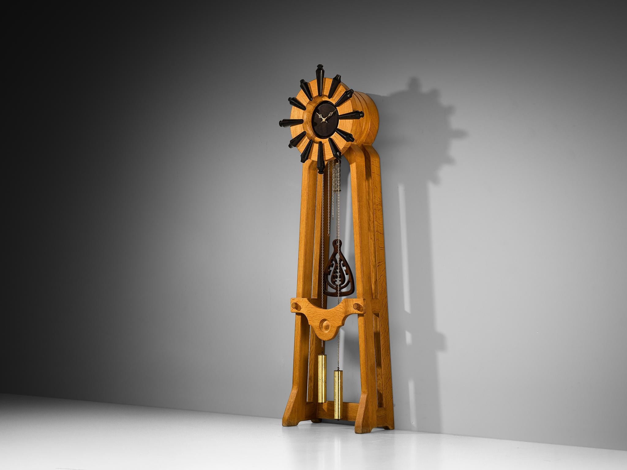Guillerme et Chambron for Votre Maison, longcase clock, oak, brass, steel, France, 1960s.

Wonderful and large clock designed by Guillerme and Chambron. The piece shows a natural and convivial design that the French designer duo are well-known for.
