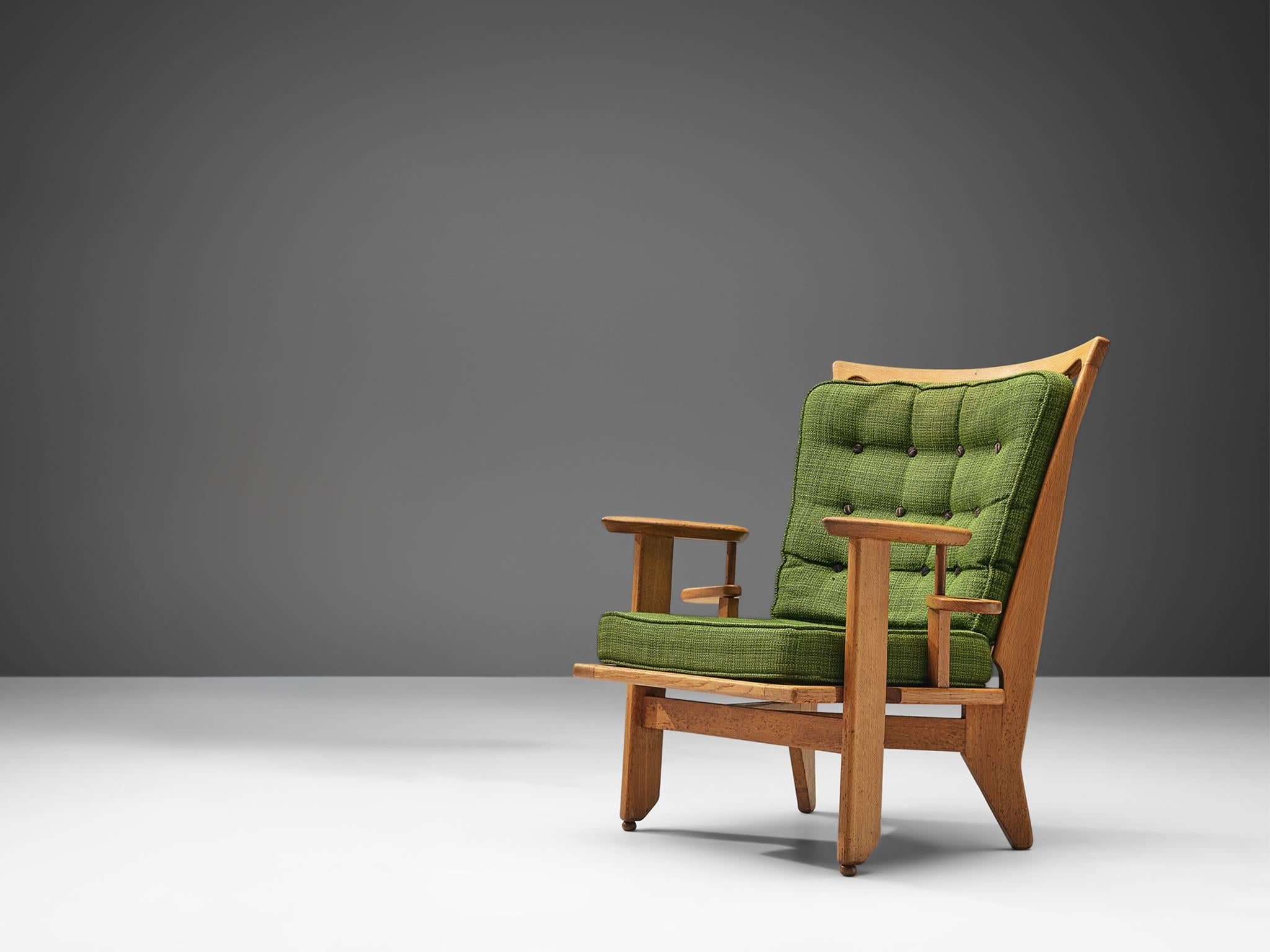 Guillerme et Chambron per Votre Maison, sedia da salotto, tessuto, rovere massiccio, Francia, anni '60

Il duo di designer francesi Guillerme et Chambron è noto per i suoi mobili in rovere massiccio di altissima qualità, di cui questa sedia è un