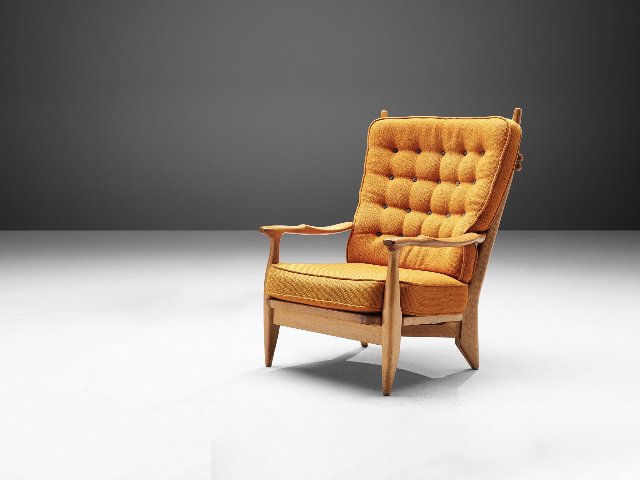 Guillerme et Chambron for Votre Maison, easy chair, oak, fabric, France, 1960s

Guillerme and Chambron are known for their high quality solid oak furniture, of which this armchair is another great example. This lounge chair has an interesting,