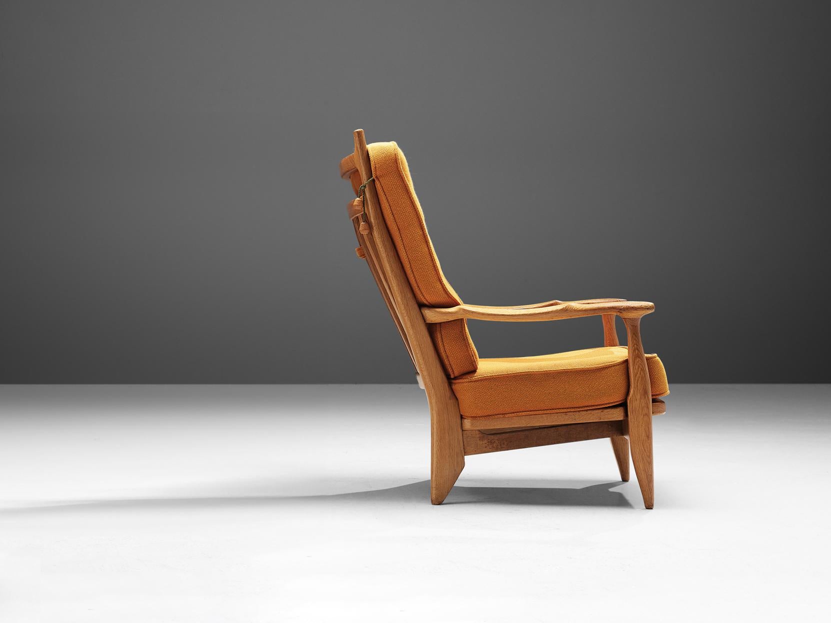 Fabric Guillerme & Chambron Lounge Chair in Oak and Ocher Yellow Upholstery For Sale