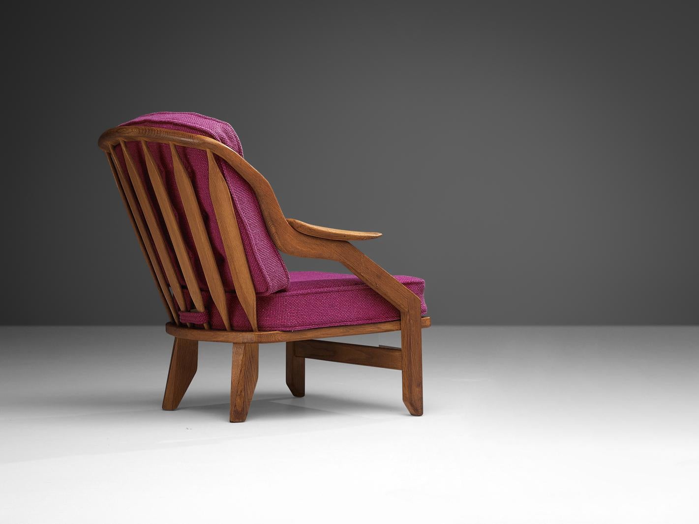 Guillerme & Chambron for Votre Maison, lounge chair, fabric, oak, France, 1960s

Guillerme and Chambron lounge chair in solid oak with the typical characteristic decorative details at the back and capricious forms of the legs. This sculptural chair