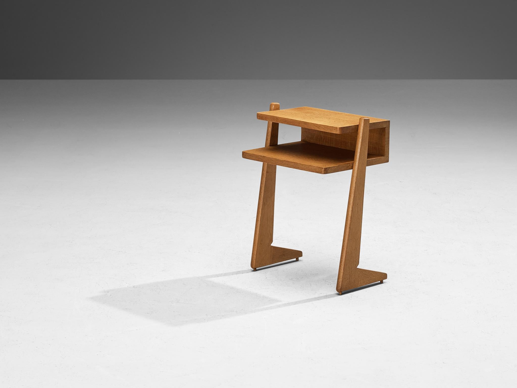 Guillerme et Chambron for Votre Maison, night side table, model '381', solid oak, France, 1960s

Night stand with a geometric shape which uses elements of balance on opposite sides, and a game of proportion. The unit is pretty corporal but easy to