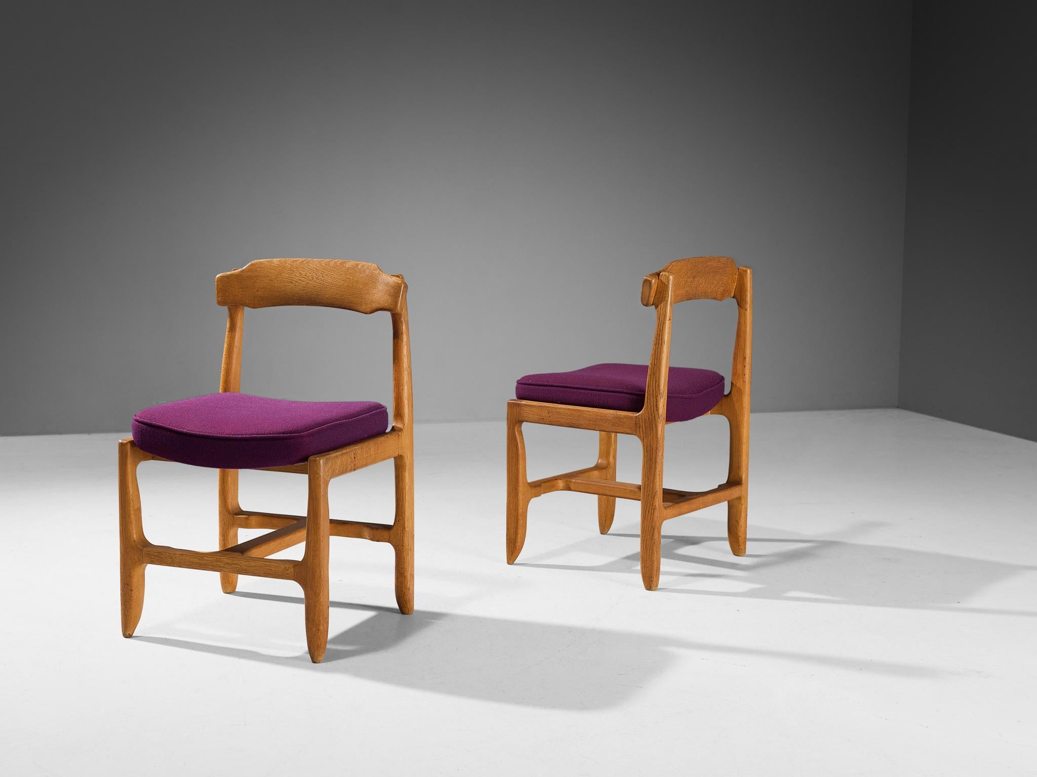 Guillerme et Chambron, pair of dining chairs, solid oak, fabric, 1960s

These distinctive chairs in solid oak are by the French designer duo Jacques Chambron and Robert Guillerme. These dining chair shows organic, tender lines almost in every aspect