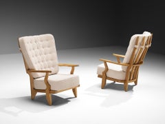 Guillerme & Chambron Pair of 'Grand Repos' Lounge Chairs in Solid Oak and Bouclé