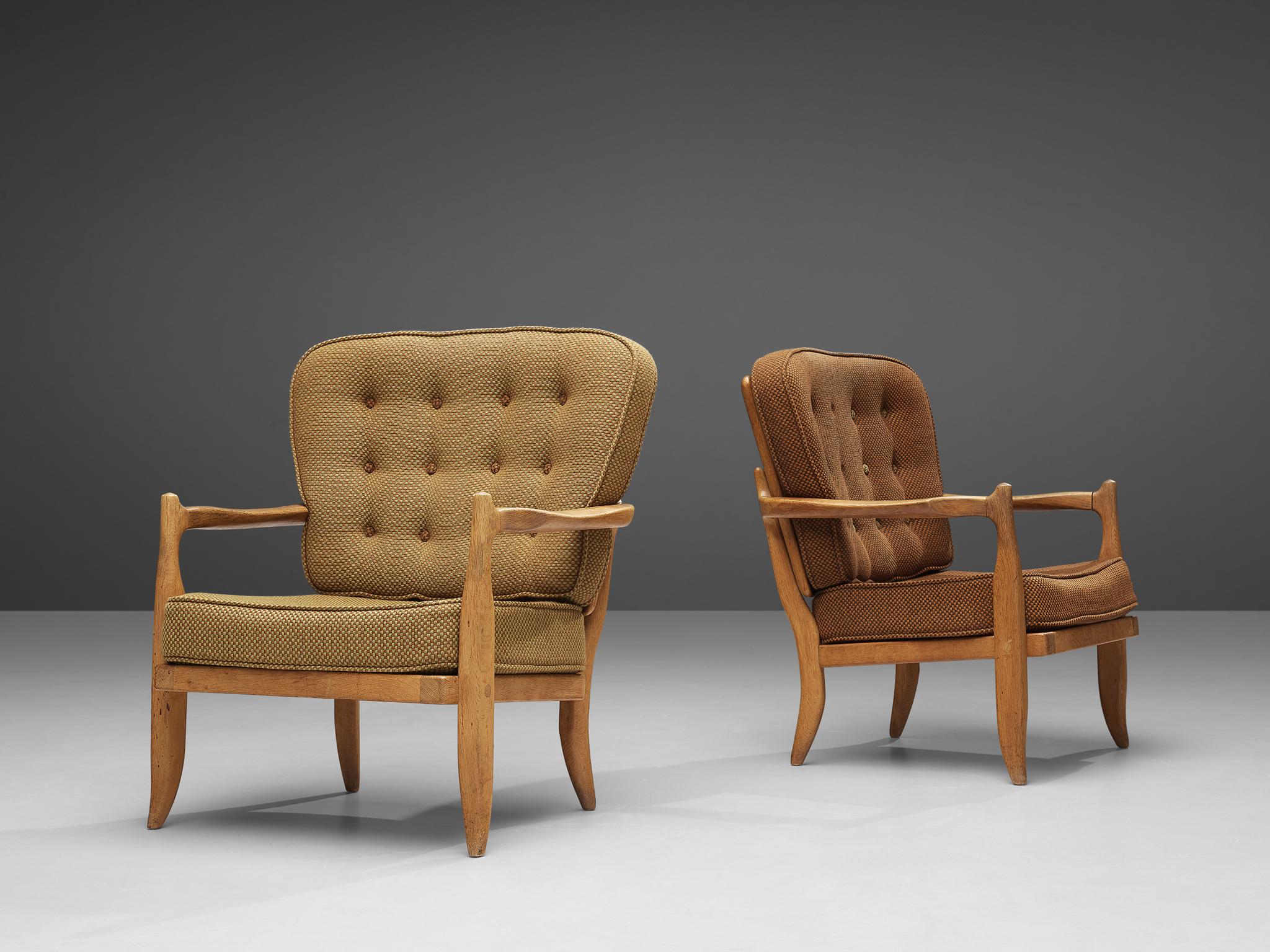 French Guillerme & Chambron Pair of 'Jose' Lounge Chairs in Oak