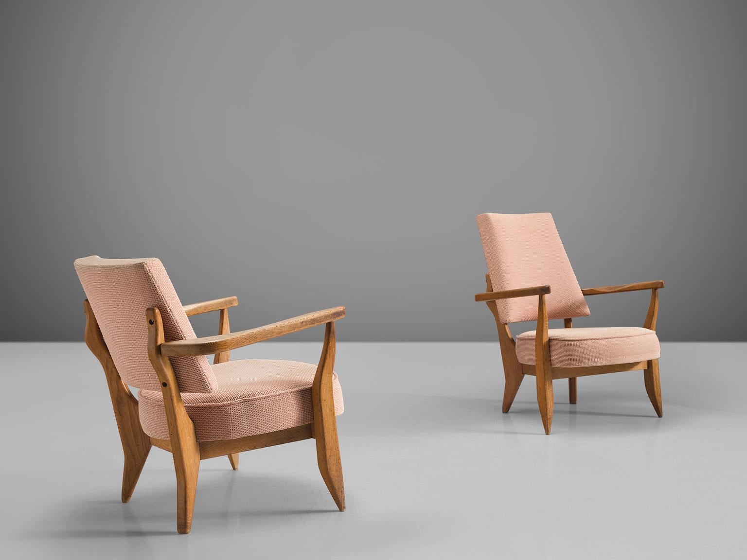 Guillerme et Chambron, pair of easy chairs, pink fabric, oak, France, 1950s

These sculptural easy chairs by Guillerme and Chambron are very well executed and made out of solid, carved oak. The greatly comfortable armchairs feature an interesting