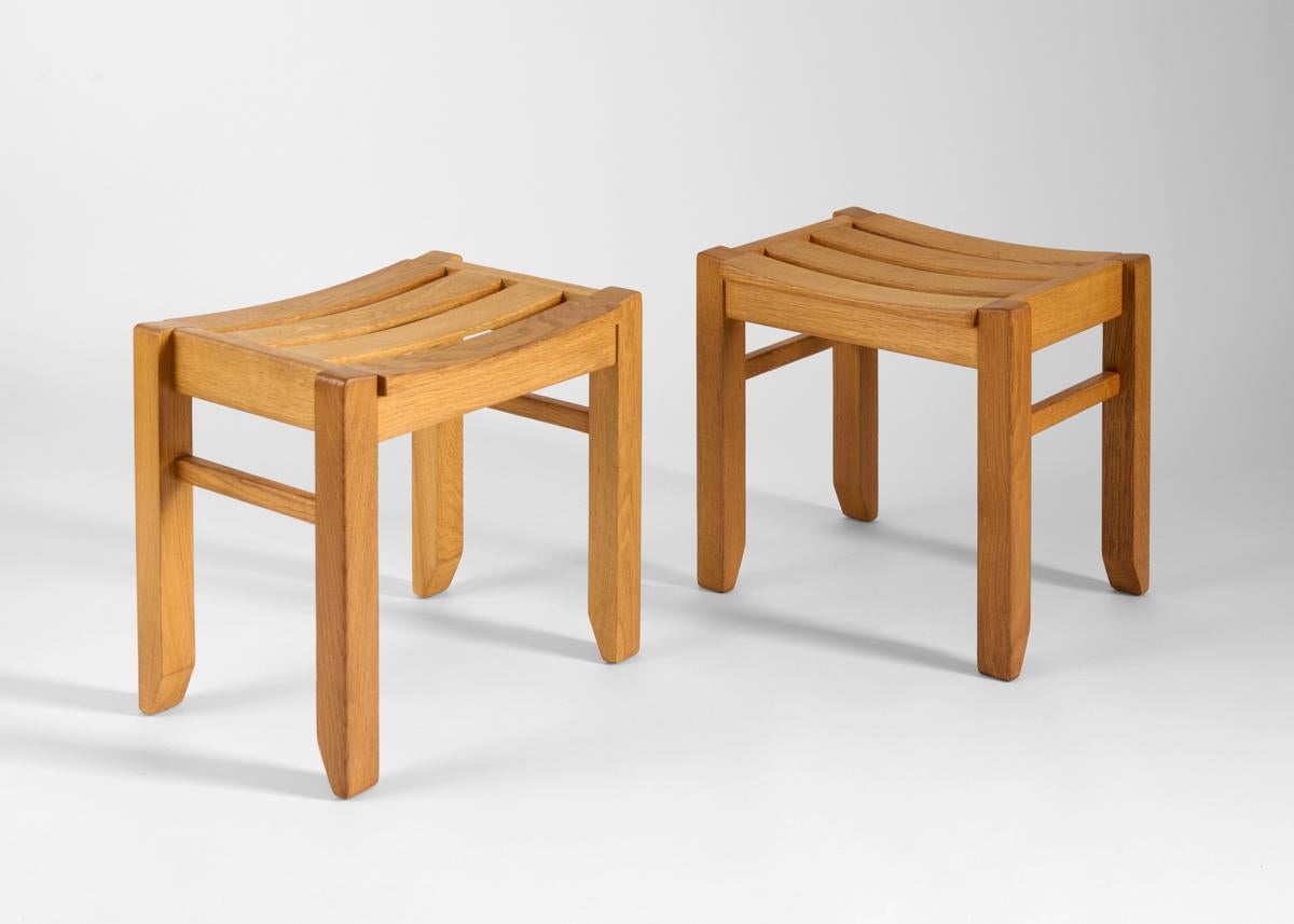 Mid-Century Modern Guillerme & Chambron, Pair of Oak Stools with Concave Seats, France, Mid-Century For Sale