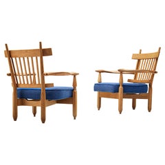 Guillerme & Chambron Pair of "Petronille" Lounge Chairs