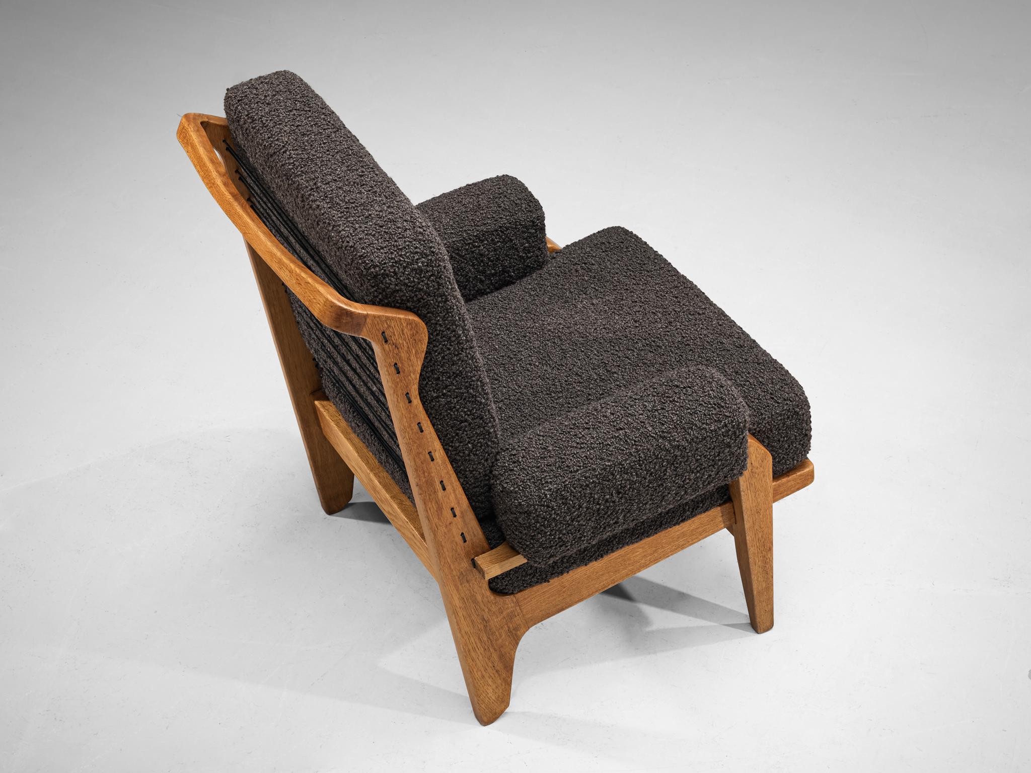 Mid-20th Century Guillerme & Chambron Pair of 'Scoubidou' Lounge Chairs in Oak and Bouclé 