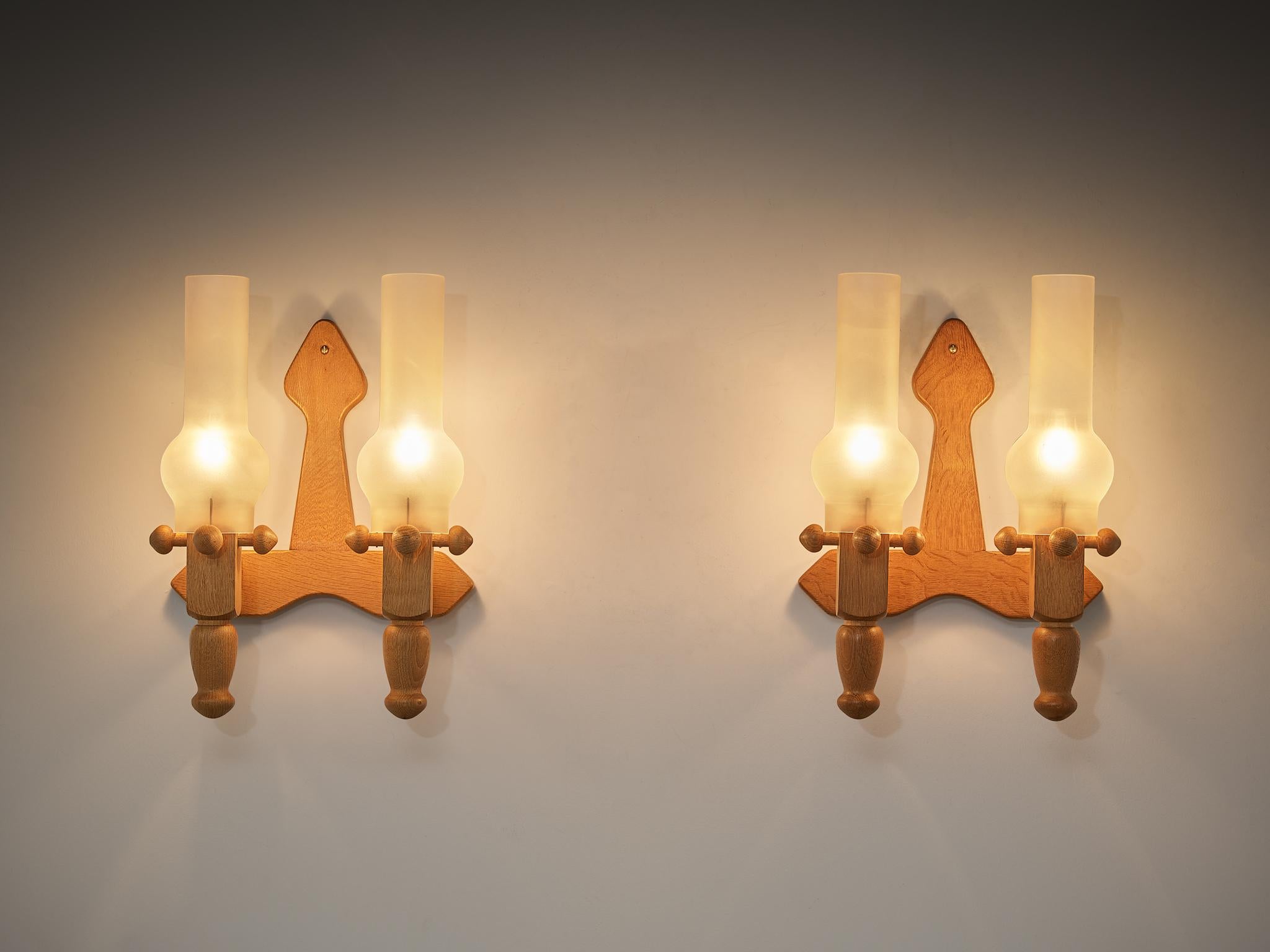 French Guillerme & Chambron Pair of Wall Lights in Oak and Glass For Sale