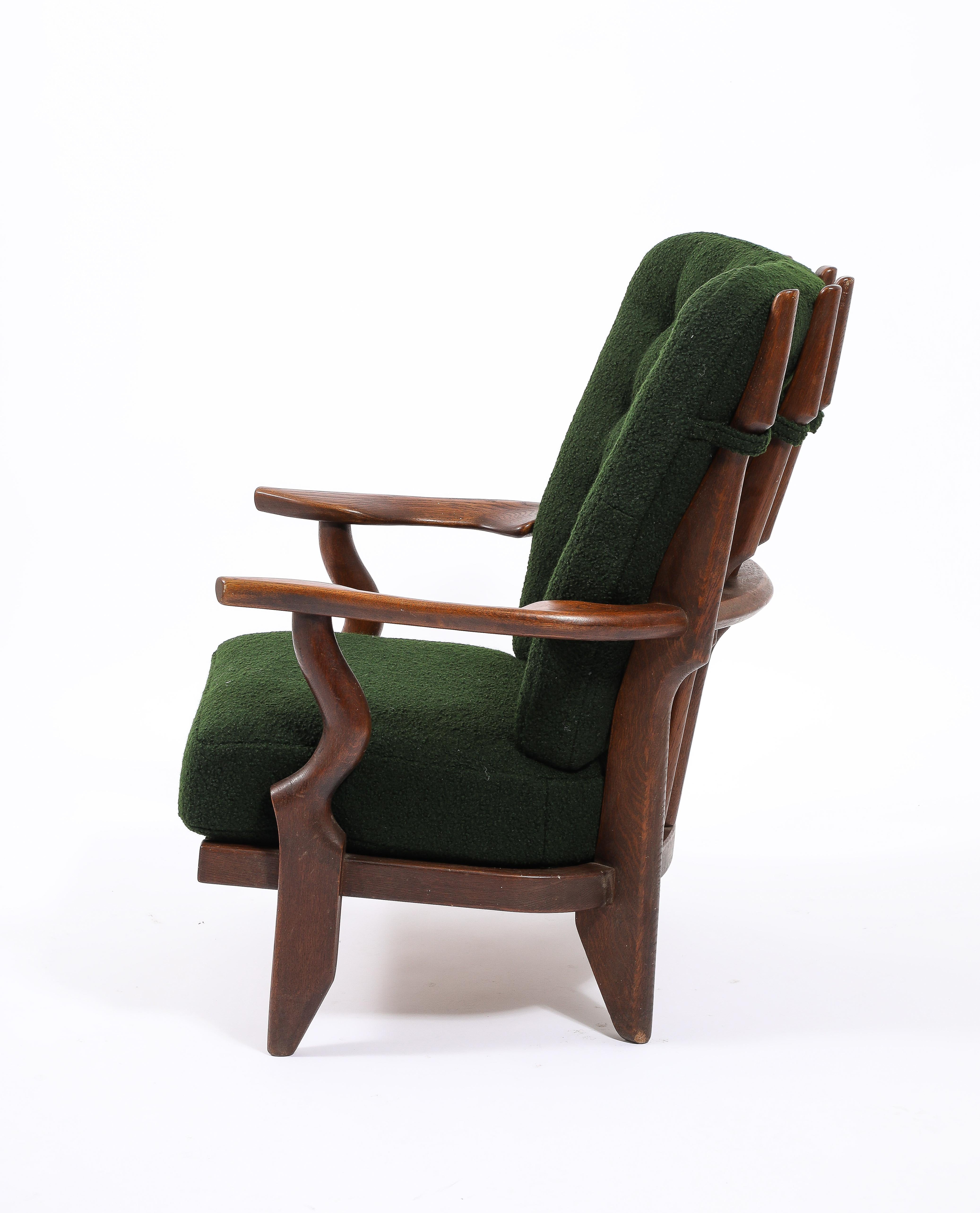 Hand-Carved Guillerme & Chambron Petit Repos Armchair in Green Bouclé, France 1950's For Sale