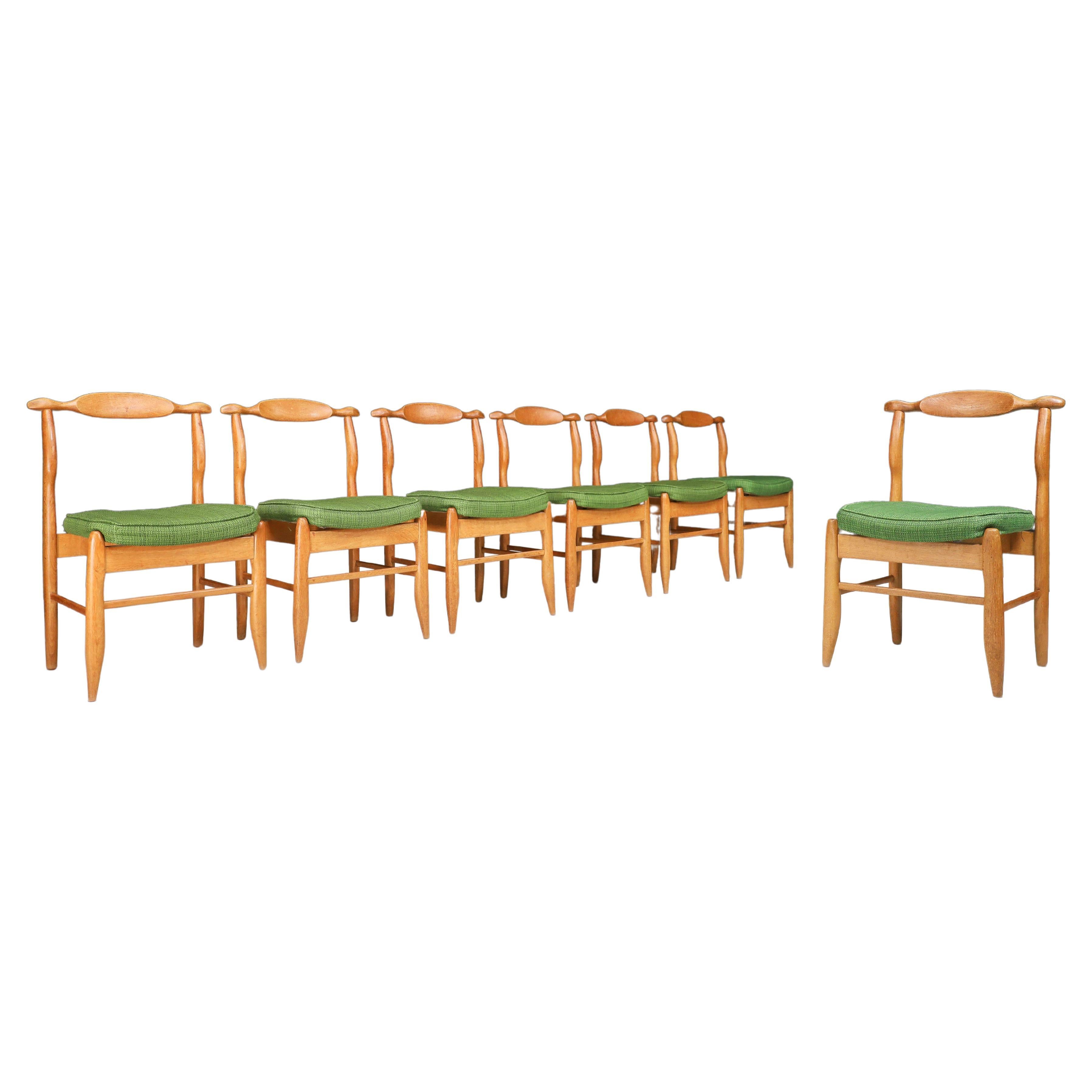 Guillerme & Chambron Set of Eight Dining Chairs in Oak and Forrest Green Fabric For Sale