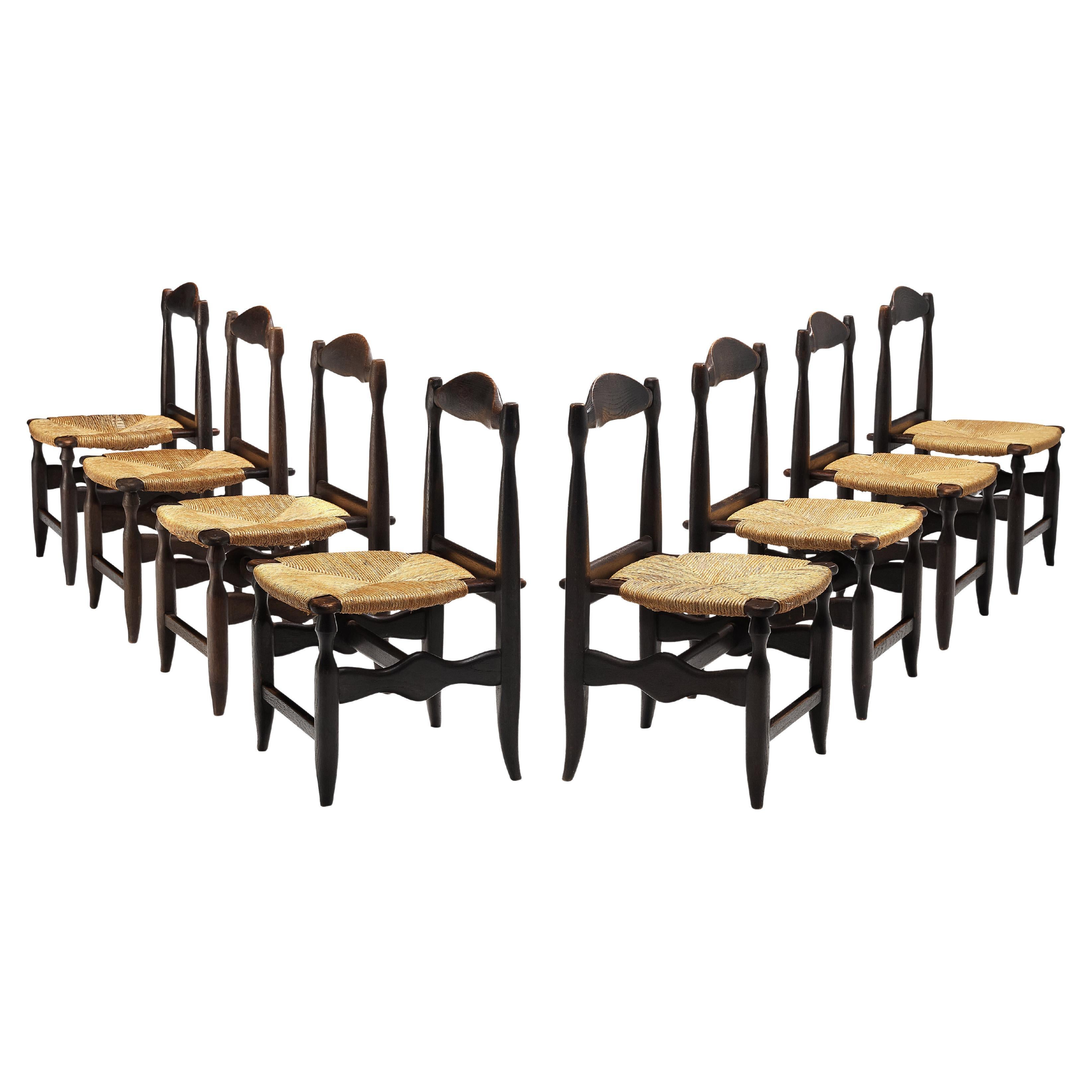 Guillerme & Chambron Set of Eight Dining Chairs in Oak and Rush