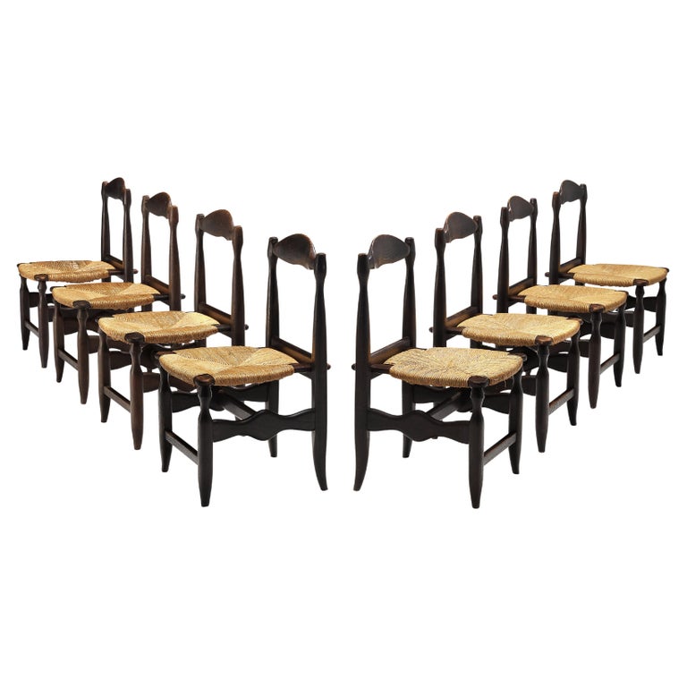 Guillerme & Chambron Set of Eight Dining Chairs in Oak and Rush For Sale