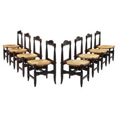Guillerme 
Chambron Set of Eight Dining Chairs in Oak and Rush
