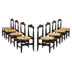 Guillerme & Chambron Set of Eight Dining Chairs in Oak and Rush