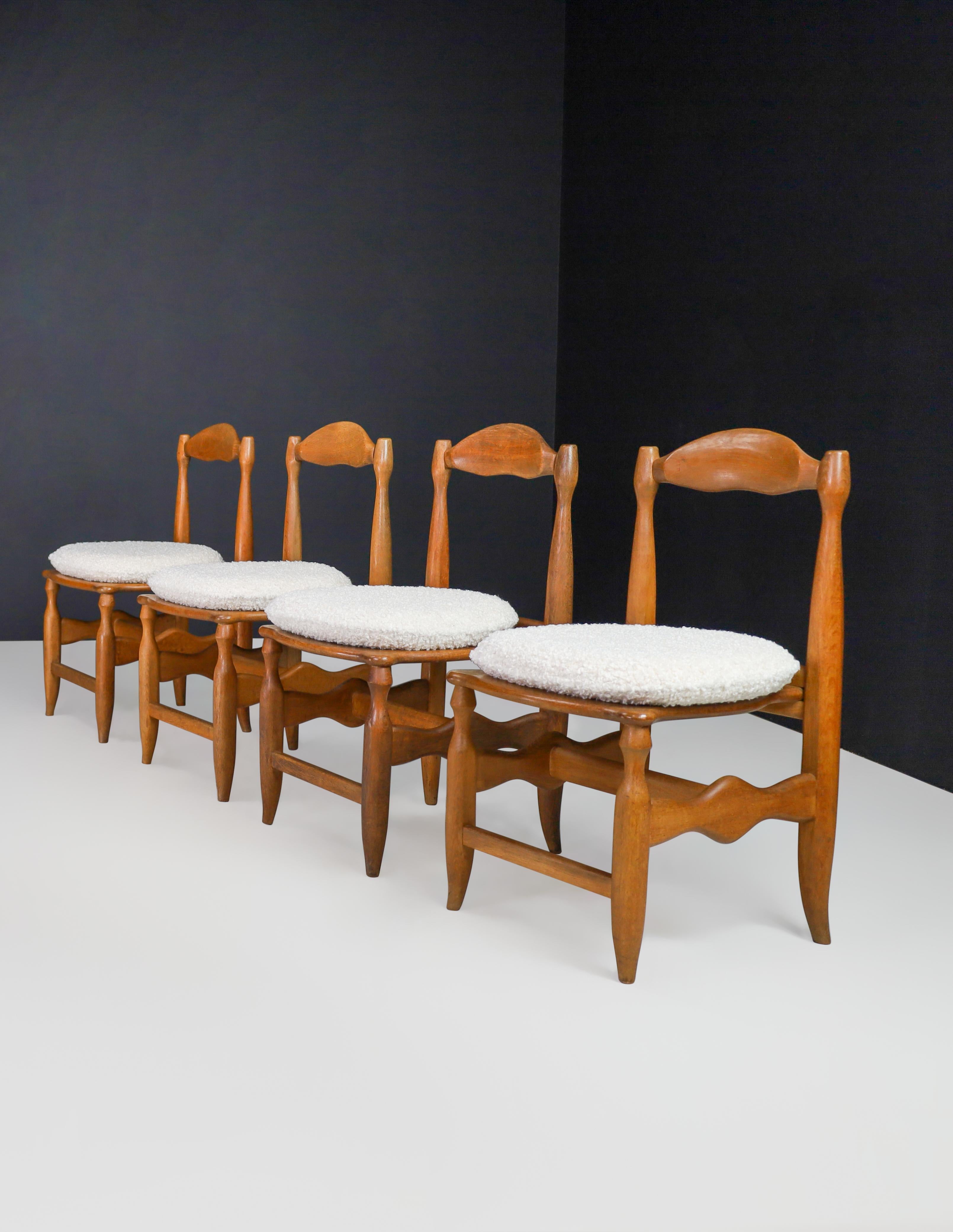 French Guillerme & Chambron Set of Eight dining room chairs in Oak and Bouclé France  For Sale