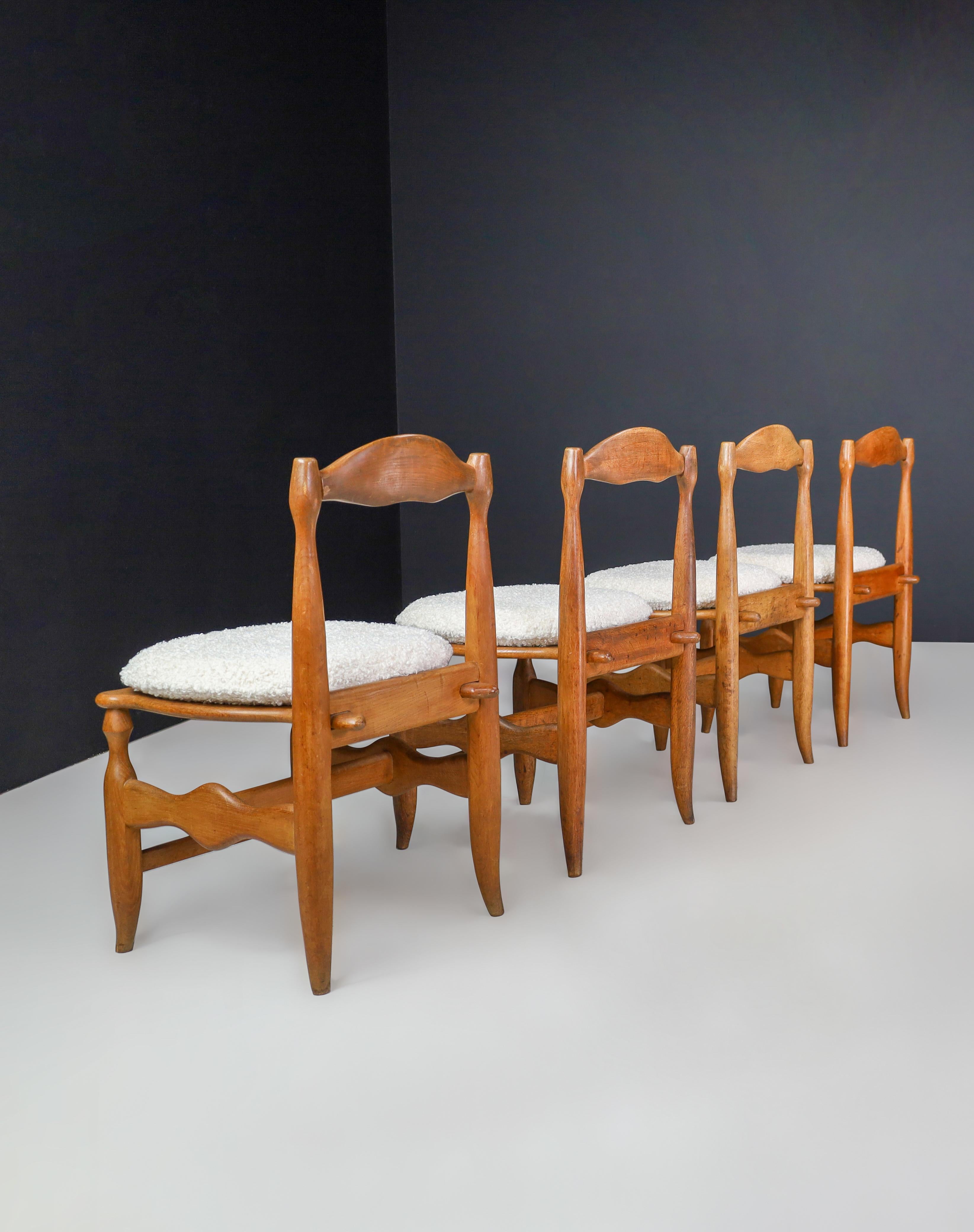 Fabric Guillerme & Chambron Set of Eight dining room chairs in Oak and Bouclé France  For Sale