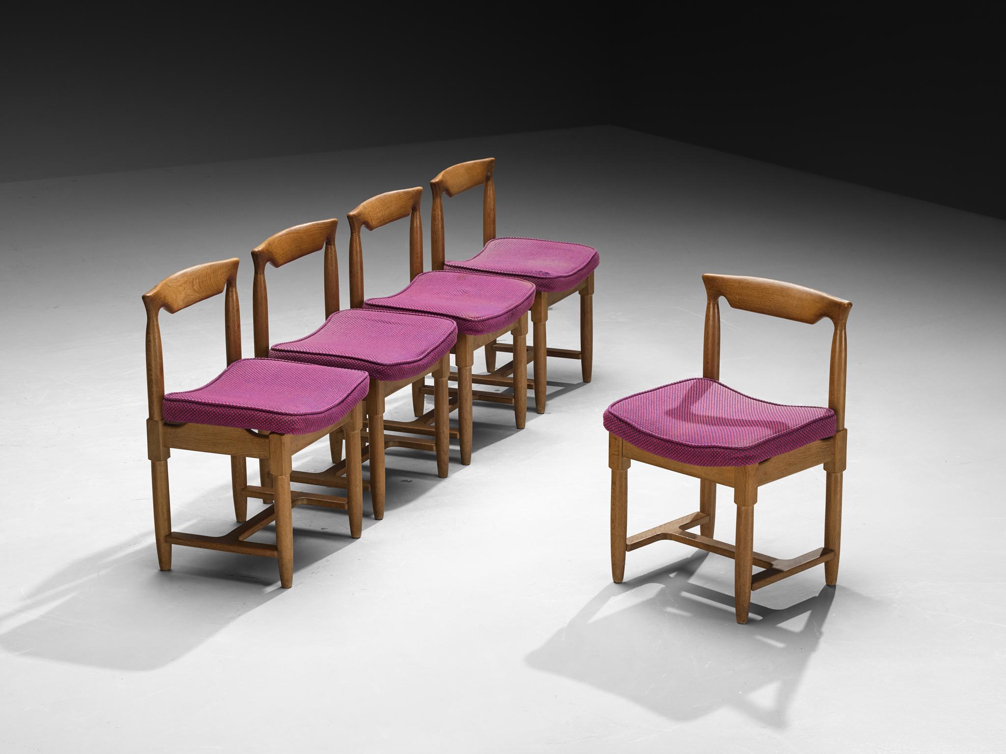 Guillerme et Chambron for Votre Maison, set of five dining chairs, solid oak, wool, France, 1960s

These charming dining chairs designed by the French duo Guillerme et Chambron exemplify their dedication to craftsmanship, simplicity in form, refined