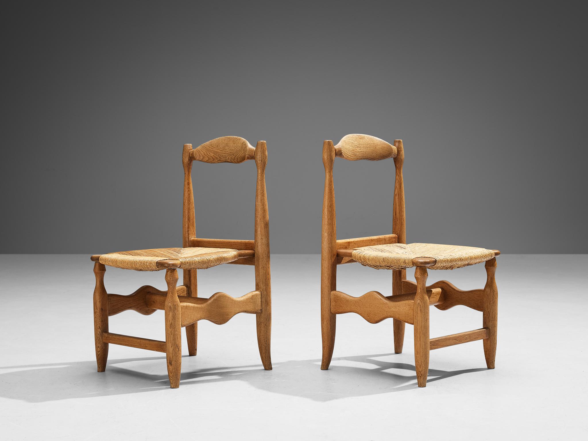 Mid-Century Modern Guillerme & Chambron Set of Four 'Charlotte' Dining Chairs in Oak and Straw For Sale