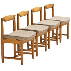 Guillerme & Chambron Set of Four Dining Chairs in Oak and Beige Fabric