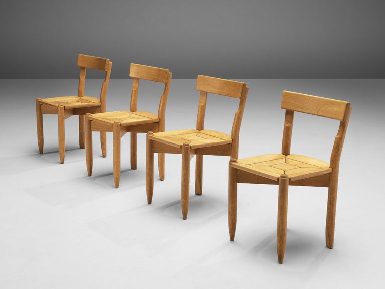 French Guillerme & Chambron Set of Four Dining Chairs ‘Trèfle’ in Solid Oak For Sale