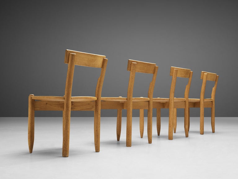 Mid-20th Century Guillerme & Chambron Set of Four Dining Chairs ‘Trèfle’ in Solid Oak For Sale