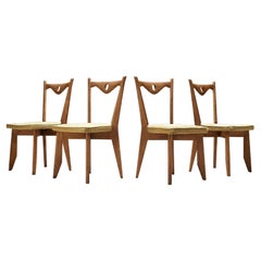 Guillerme & Chambron Set of Four 'Thibault' Chairs in Oak and Wool 