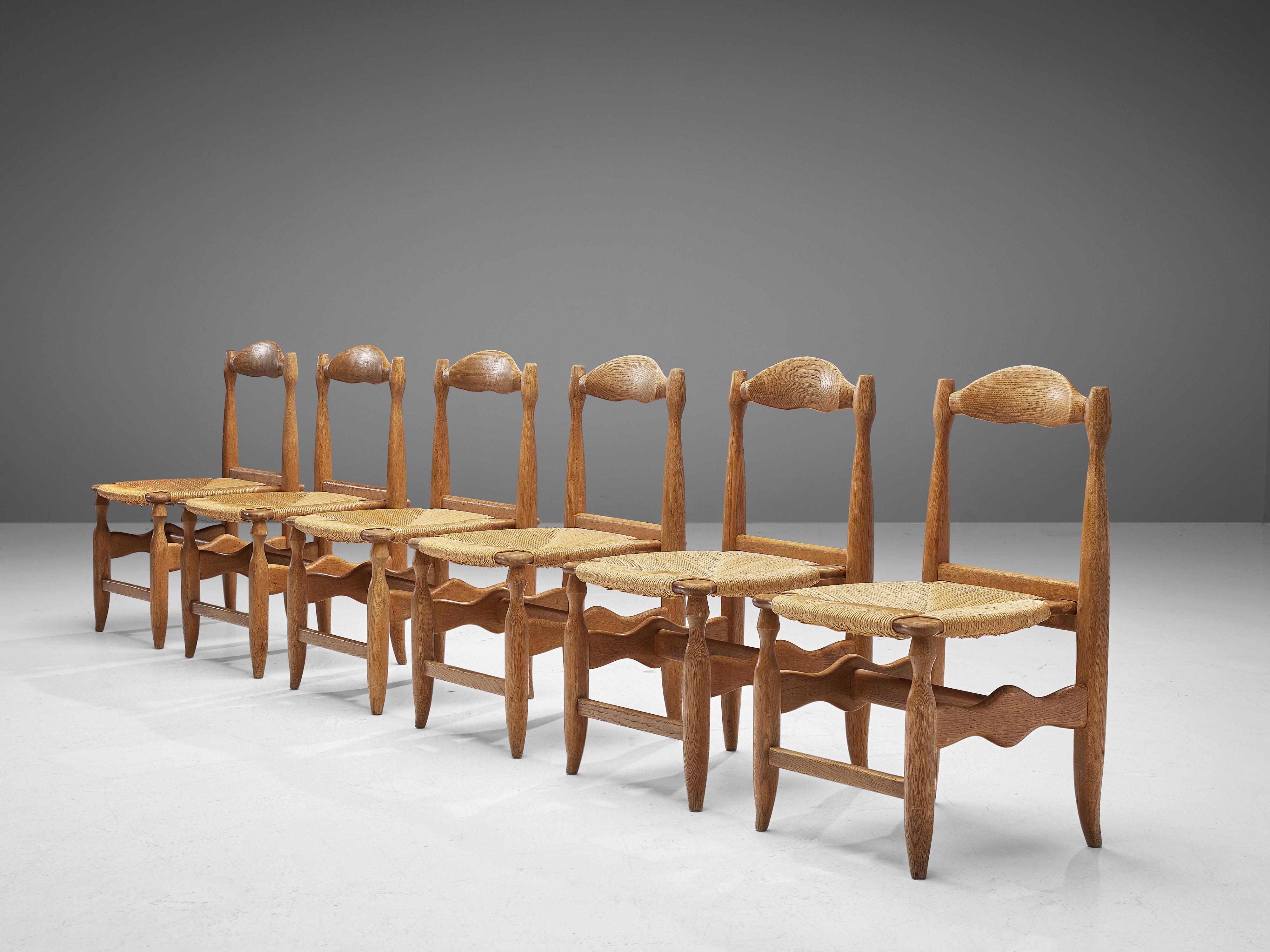 Guillerme & Chambron for Votre Maison, dining chairs model 'Charlotte', oak, straw, France, 1960s

Set of six rustic, yet elegant dining chairs in solid oak by Guillerme & Chambron. These chairs show the characteristic frame of this French