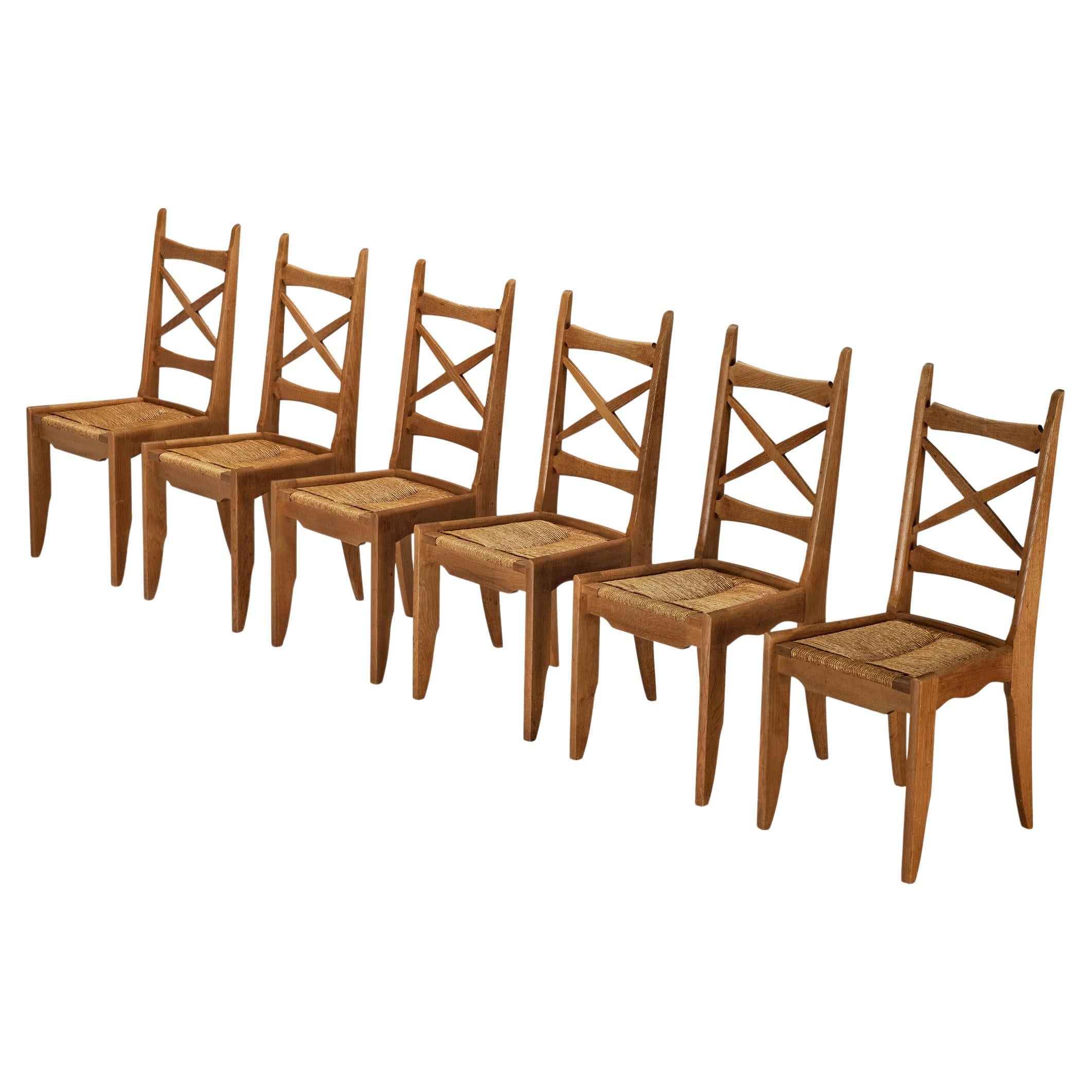 Guillerme & Chambron Set of Six Dining Chairs in Oak and Straw