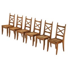 Guillerme & Chambron Set of Six Dining Chairs in Oak and Straw