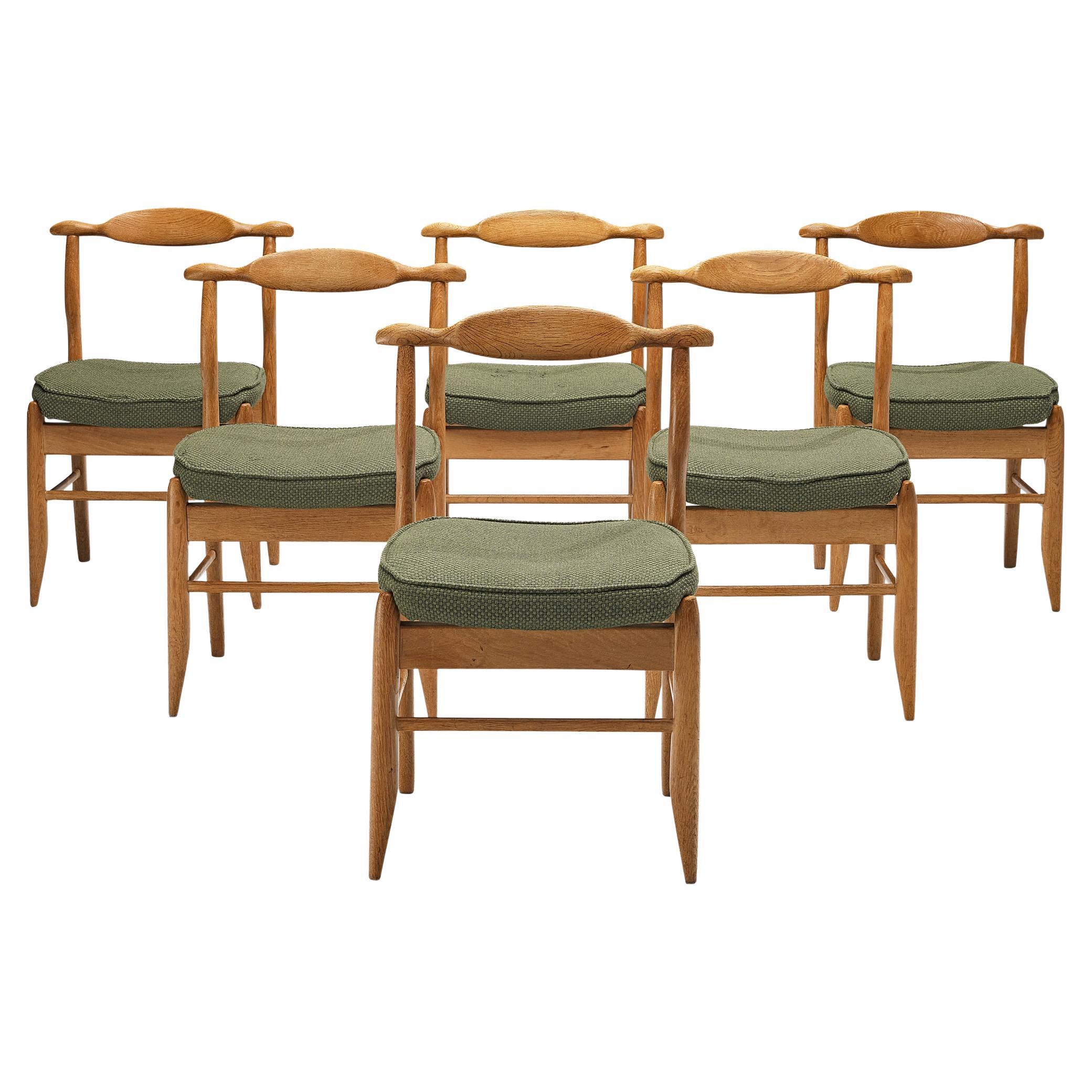 Guillerme & Chambron Set of Six 'Fumay' Dining Chairs in Oak and Green Fabric