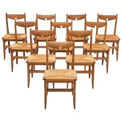 Guillerme 
Chambron Set of Ten Chairs in Oak and Cord